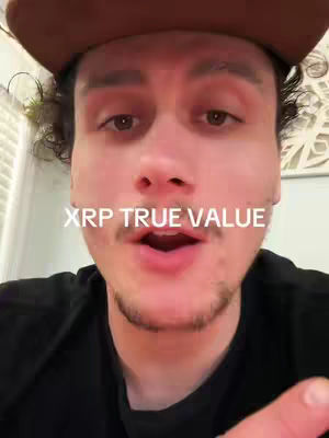 A selfie-style video shows a man with short, curly hair and a mustache. He wears a brown cap and a black shirt. The background is blurred, and the text 'XRP TRUE VALUE' is overlaid on the image.