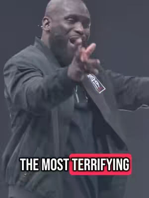 The cover image shows a bald Black man in a dark jacket gesturing towards the viewer with an open mouth as if speaking. The text overlay reads "THE MOST TERRIFYING" over a red background.