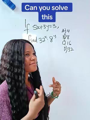 A woman with long, dark wavy hair stands near a whiteboard. The whiteboard has a math problem written on it, along with multiple-choice answers. A blue box at the top says 'Can you solve this'. The woman is gesturing with her hands as if explaining the problem. The background is a plain white wall.