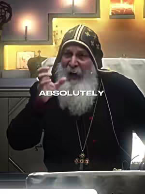 The cover image features a man with a white beard, wearing a black robe and hat and holding a cross necklace. Text overlayed says 'ABSOLUTELY.' The man is speaking with an expressive gesture.