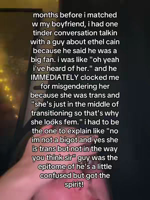 The image shows a close-up of a person's hand holding a phone screen. The screen displays a series of white text on a darker background, making the words stand out. The hand and phone are slightly out of focus, suggesting the focus is on the text. The overall image is dark, with soft lighting.