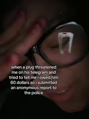The cover image is a close-up shot of a person wearing glasses, with their hand partially covering their face. The person's eye is visible through the glasses, and text is overlaid on the image, describing an anonymous report to the police.