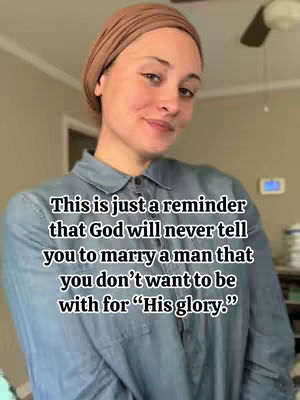 A woman with fair skin and brown headscarf poses for the camera. Behind her is a beige wall, and a ceiling fan is partially visible. Text overlayed on the image reads, 'This is just a reminder that God will never tell you to marry a man that you don't want to be with for "His glory."'