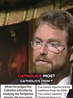 A man in glasses and a beard is centered in the frame, looking slightly off to the side with a contemplative expression. Above him, red text states a claim about Catholics, with additional text boxes below providing further context. The color scheme is muted, with natural skin tones and a background that hints at a formal setting against a neutral backdrop.