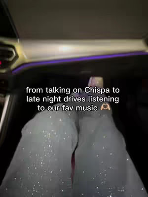 The image shows the interior of a car, with focus on a person's legs and feet resting near the dashboard. The legs are covered in a sparkly fabric. Text about late night drives is overlaid on image.