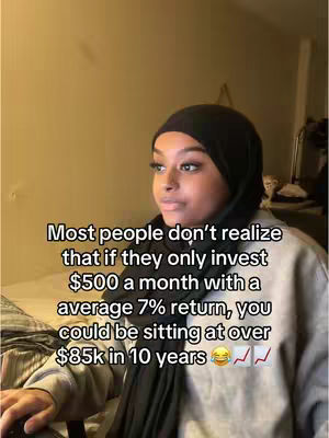 A young woman wearing a black headscarf and a grey sweater is looking to the side as text overlays the image. The background is a plain, light yellow wall.