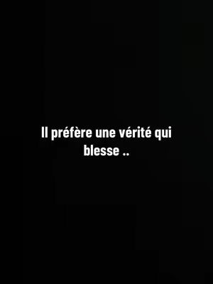 The cover image is entirely black with white text in the center. The text reads in French: "Il préfère une vérité qui blesse ..", which translates to "He prefers a truth that hurts ..". The text is in a simple, sans-serif font.