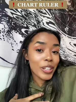 A young woman with dark hair, wearing a green hoodie, is centered in the frame, looking directly at the camera and speaking. Behind her is a tapestry with a black and white pattern. Above her head, a banner reads "! CHART RULER !" in capital letters.