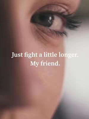 The image is a close-up of a person's eye, with the focus on the eye and the surrounding skin. The skin tone is light, and the eyelashes are visible, and there is text overlaying the image in white. The upper part of the eye and eyebrow are visible, with a soft, blurred background emphasizing the eye.