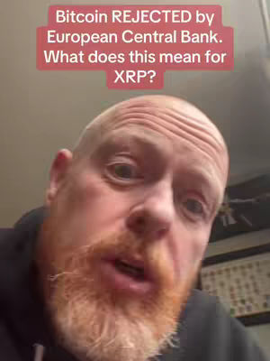 A close-up shot of a man with a bald head and a red beard, speaking directly to the camera. A text overlay in a red box at the top says, "Bitcoin REJECTED by European Central Bank. What does this mean for XRP?" The background suggests an interior setting.