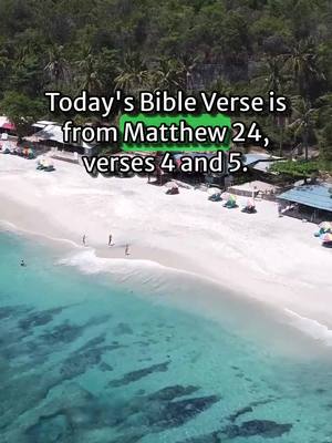 An aerial view of a tropical beach with white sand, turquoise water, and lush green vegetation in the background. Overlaid text conveys a Bible verse reference.