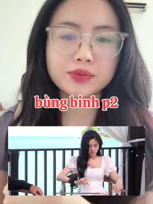 A woman with glasses and long dark hair is in the foreground. The text 'bừng bình p2' in a red box overlay appears on the image. Below, inside a smaller frame, a woman in a white dress sits on a chair in front of a scenic background.
