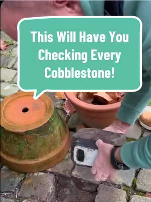 The cover image shows a person's hands interacting with outdoor objects related to geocaching. A light green speech bubble over the image contains white text and draws attention to the main points. The scene is set outdoors on what looks like a stone path.