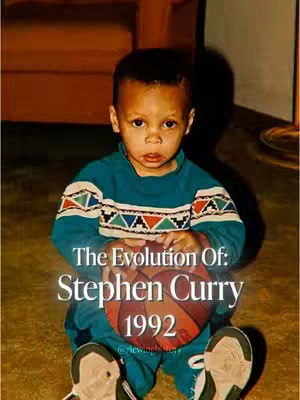 A young child, likely Stephen Curry, is seated and holding a basketball. The child has short hair and is wearing a teal sweater with a patterned yoke. The text overlay reads 'The Evolution Of: Stephen Curry 1992'.