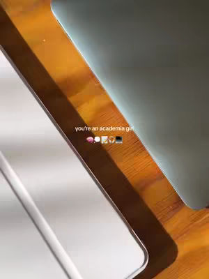 The cover image shows a top-down view of a desk with a laptop, tablet, and a pen. The desk is wooden, and the items rest on it diagonally. Small stickers with different colors or shapes and the text overlay are visible.