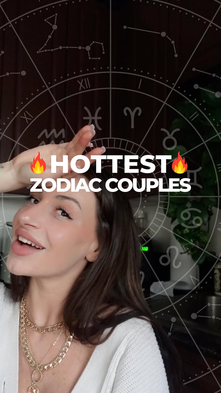 A woman with long brown hair is featured in a vertical shot. She poses with her hand near her forehead, with a cheerful expression. Overlaid on the image are the words "HOTTEST ZODIAC COUPLES" with flames on either side. The background shows a zodiac wheel's symbols.