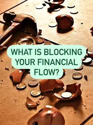 The image features a close-up view of a surface, possibly wood, with various elements scattered across it. The primary focus is a broken piggy bank, situated in the center, its pieces strewn about. Several coins are visible, some lying near the broken bank and others scattered in the background. A hammer is positioned on the left side, adding to the theme of destruction. The color palette is warm and earthy, with tones of brown, beige, and gold.