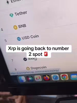A screenshot of a computer screen displaying a cryptocurrency ranking. The screen shows various cryptocurrencies such as Tether, BNB, USD Coin, and XRP. The text overlay says "Xrp is going back to number 2 spot".