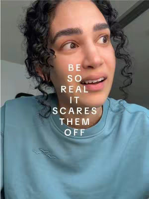 A close-up shot of a person with dark, curly hair looking slightly to the side with an open mouth and wide eyes, displaying a surprised or thoughtful expression. Overlayed on the image is white text arranged vertically, conveying a message.