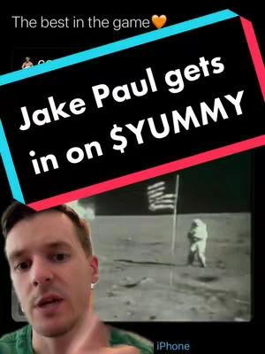 The cover image shows a man speaking with a portion of a moon landing scene in black and white behind him. Overlay text in a colored banner reads "Jake Paul gets in on $YUMMY."