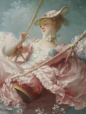 A close-up of a Rococo painting titled "The Swing." A woman in a pink dress and large hat is swinging. The background shows a light blue sky with some foliage.
